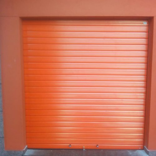 puerta-enrollable-ciega-naranja